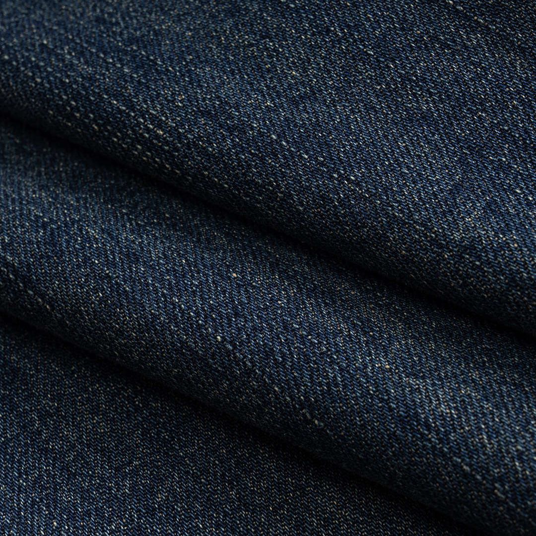 Tvåtonade denimjeans med vågformade paneler, hög midja och breda ben i kraftig bomullsblandning