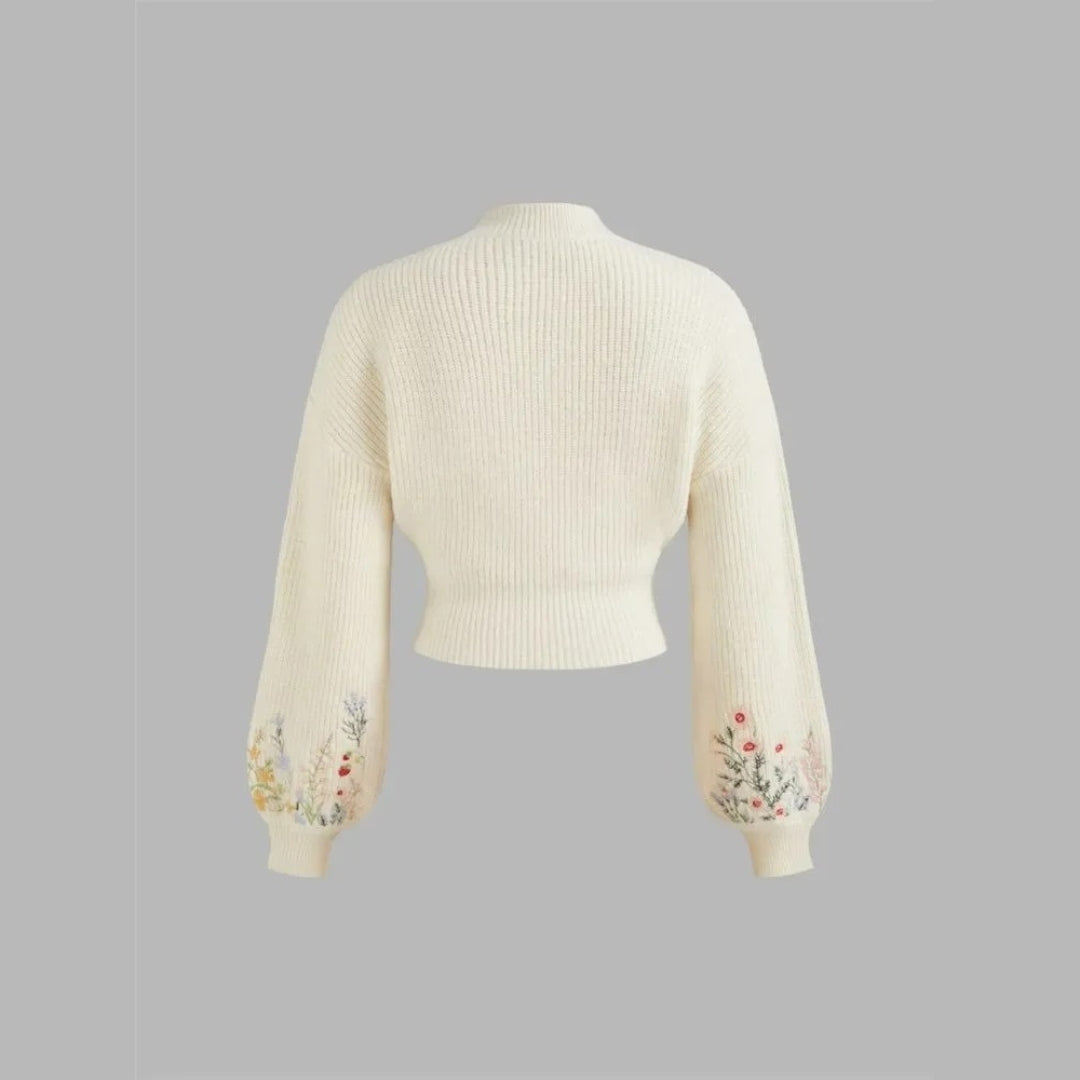 Stickad tröja med blommig brodyr och ballongärm