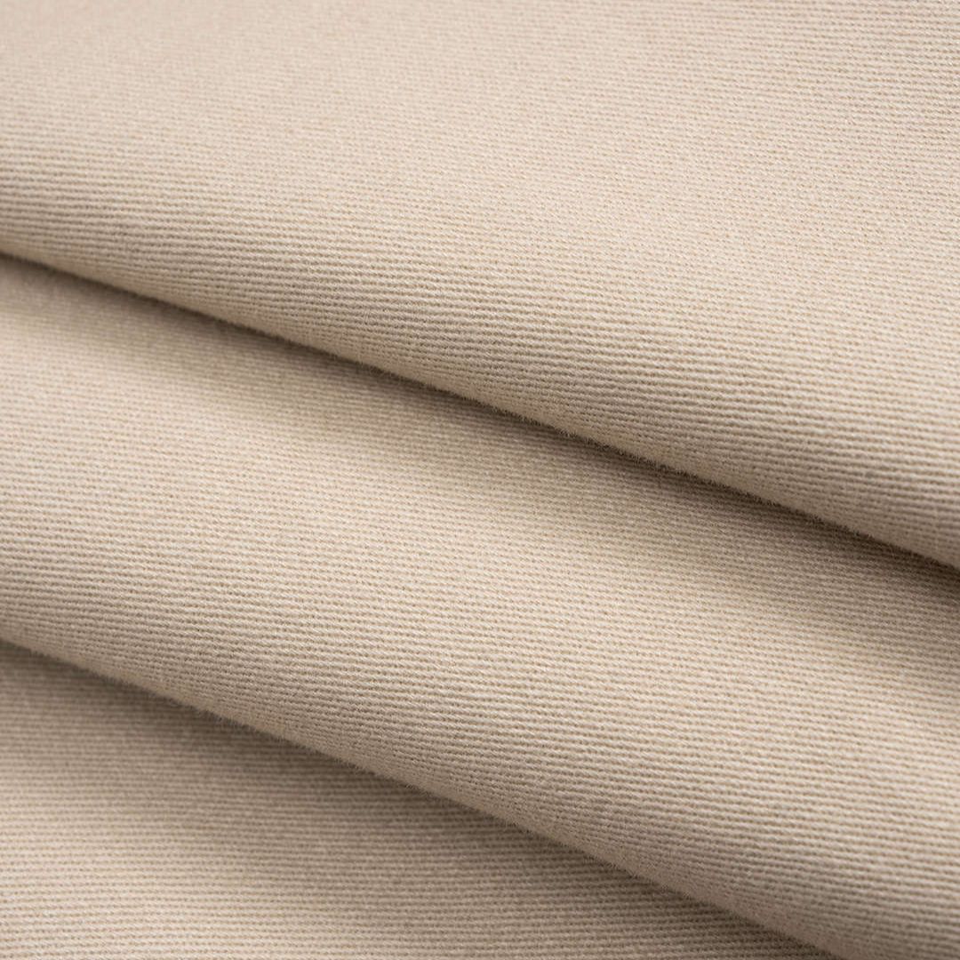 Beige utilityjacka i vävd twill med bälte fickor och voluminösa ärmar