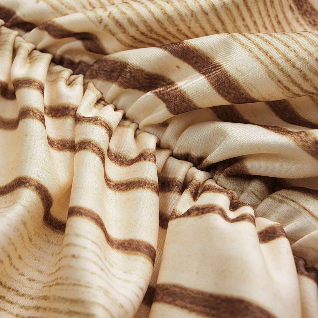 Ärmlös lång klänning i stretchjersey med marmorerat mönster och draperad midja