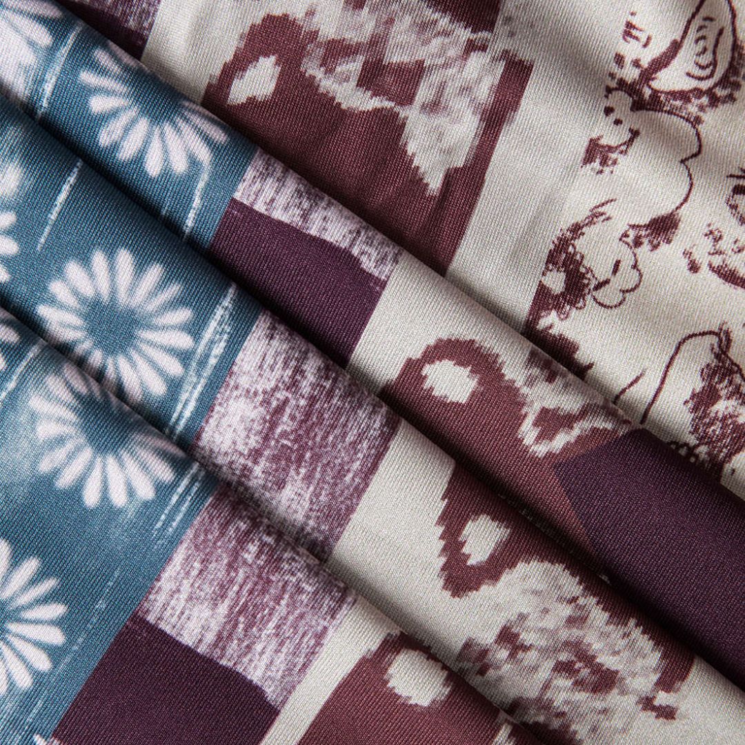 Mönstrad maxiklänning i mjukt stretchtyg med figurnära passform och patchwork