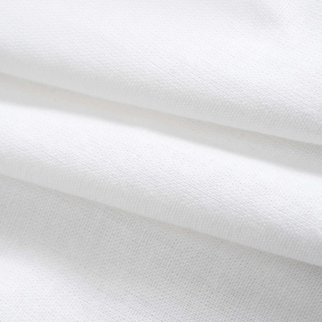 Vit skjortblus i bomull med midjedragning och breda manschetter