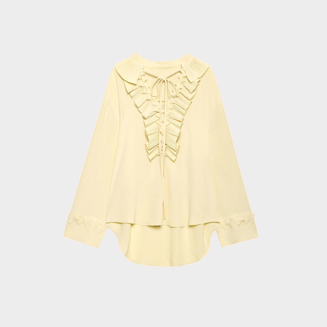 Blus med volangdetaljer och knytband samt asymmetrisk midikjol set