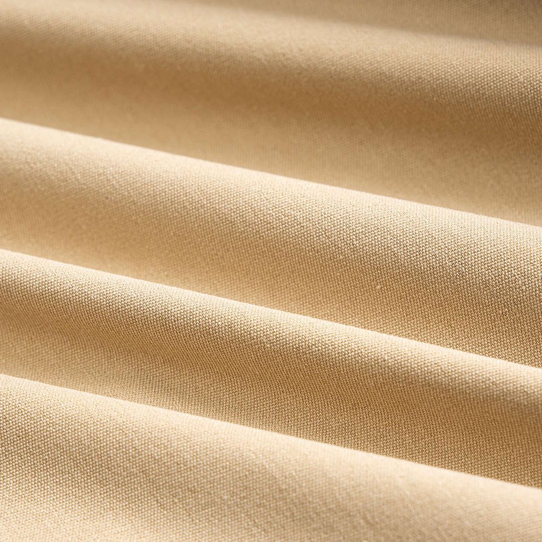 Beige lång jacka i klänningsstil med volangkjol och knytbälte