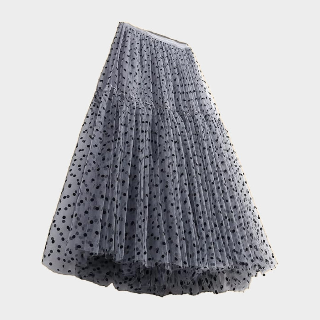 Kjol i tyll med prickmönster empiremidja A-linje silhuett och ankellängd