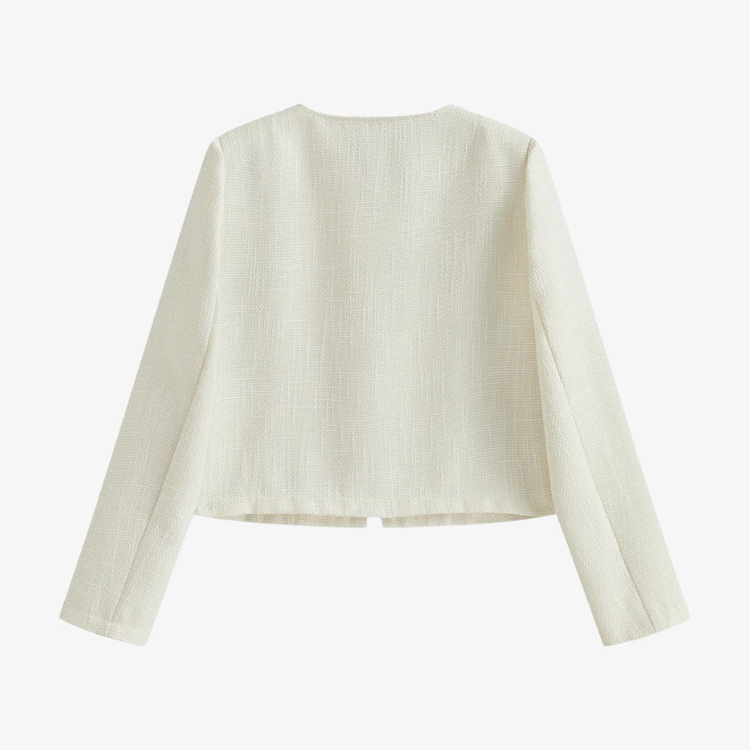 Vit boucléjacka med kontrasterande denimkanter