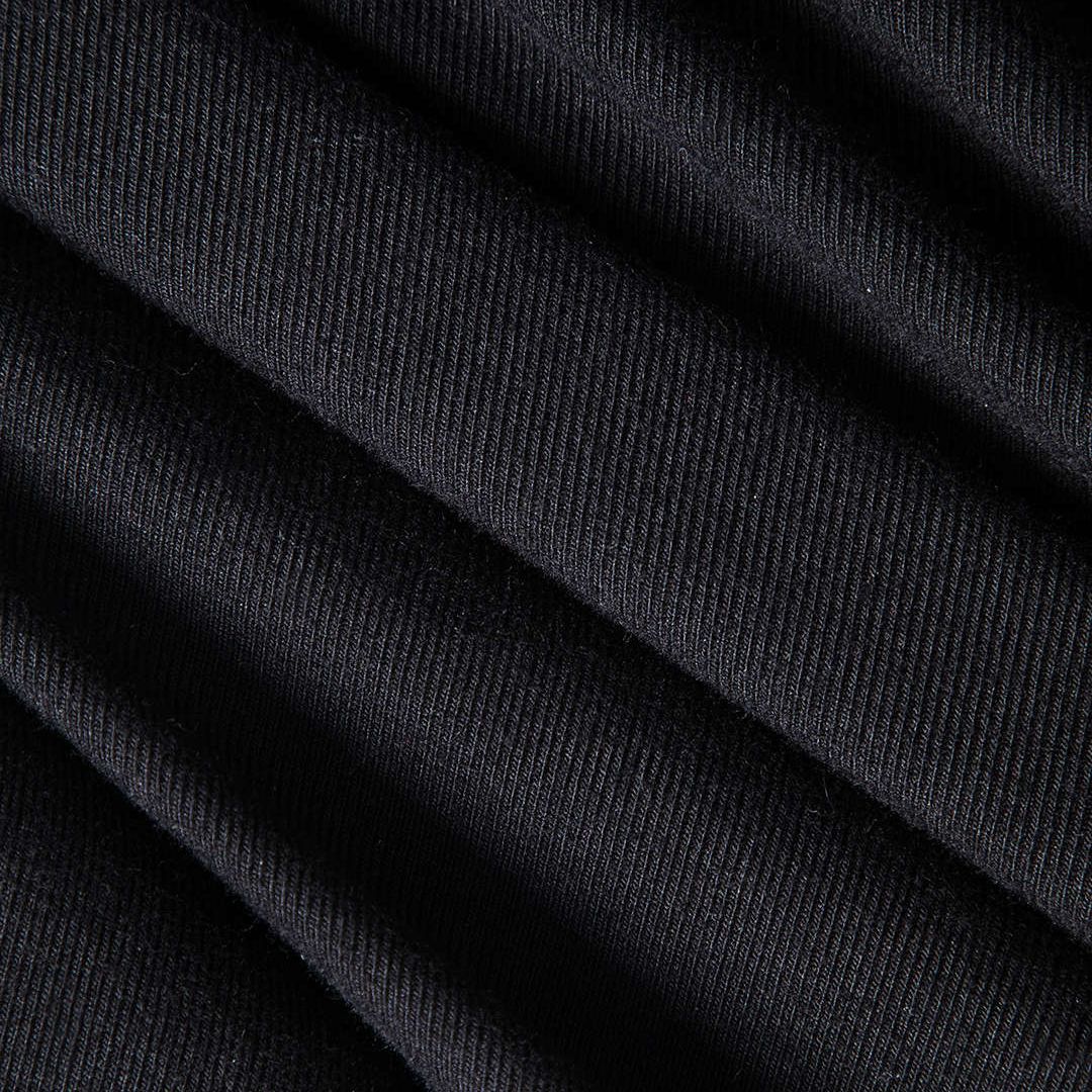 Midiklänning med långärmad topp i glansig krokodilpräglad imitation och draperad kjol i jersey med hög slits