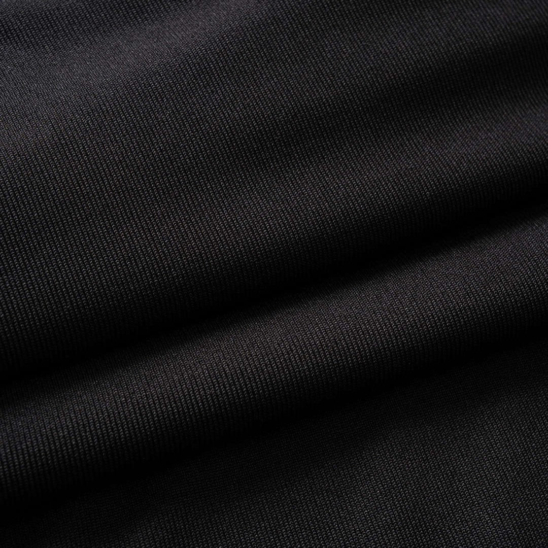 Svart maxiklänning med utskärning, korsad topp och låg stretch