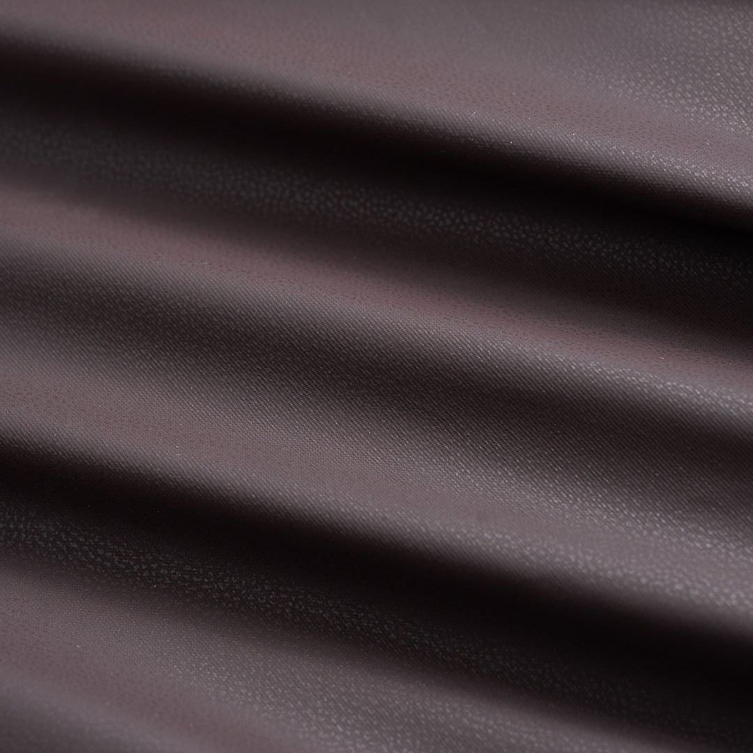 Kaffe kort vadderad jacka i matt material med ståkrage och tryckknappar