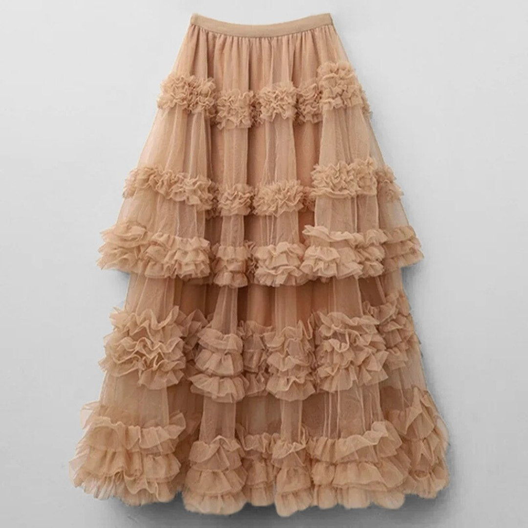 Kjol i spets med lagerdetaljer, naturlig midja, A-linje silhuett och volym