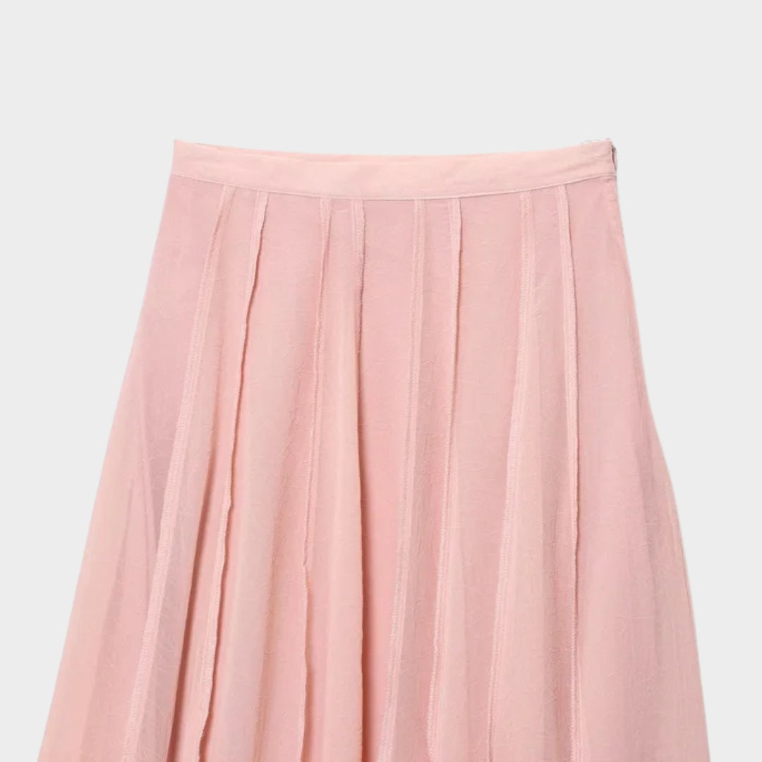 Ljusrosa Långkjol i ljusrosa med A-linjeform och svepande silhuett