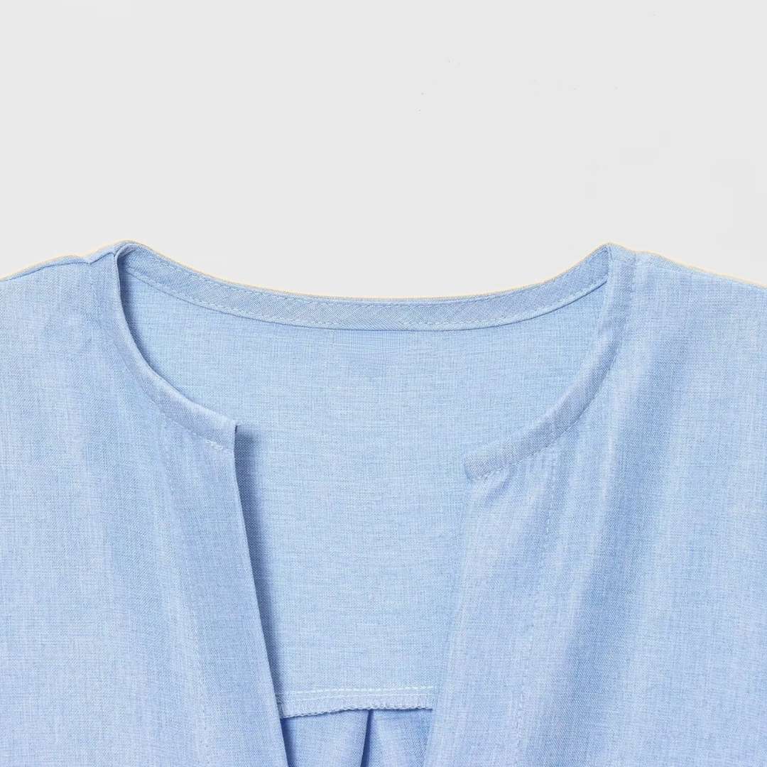 Blus med puffärm och knytband framtill i vävt tyg