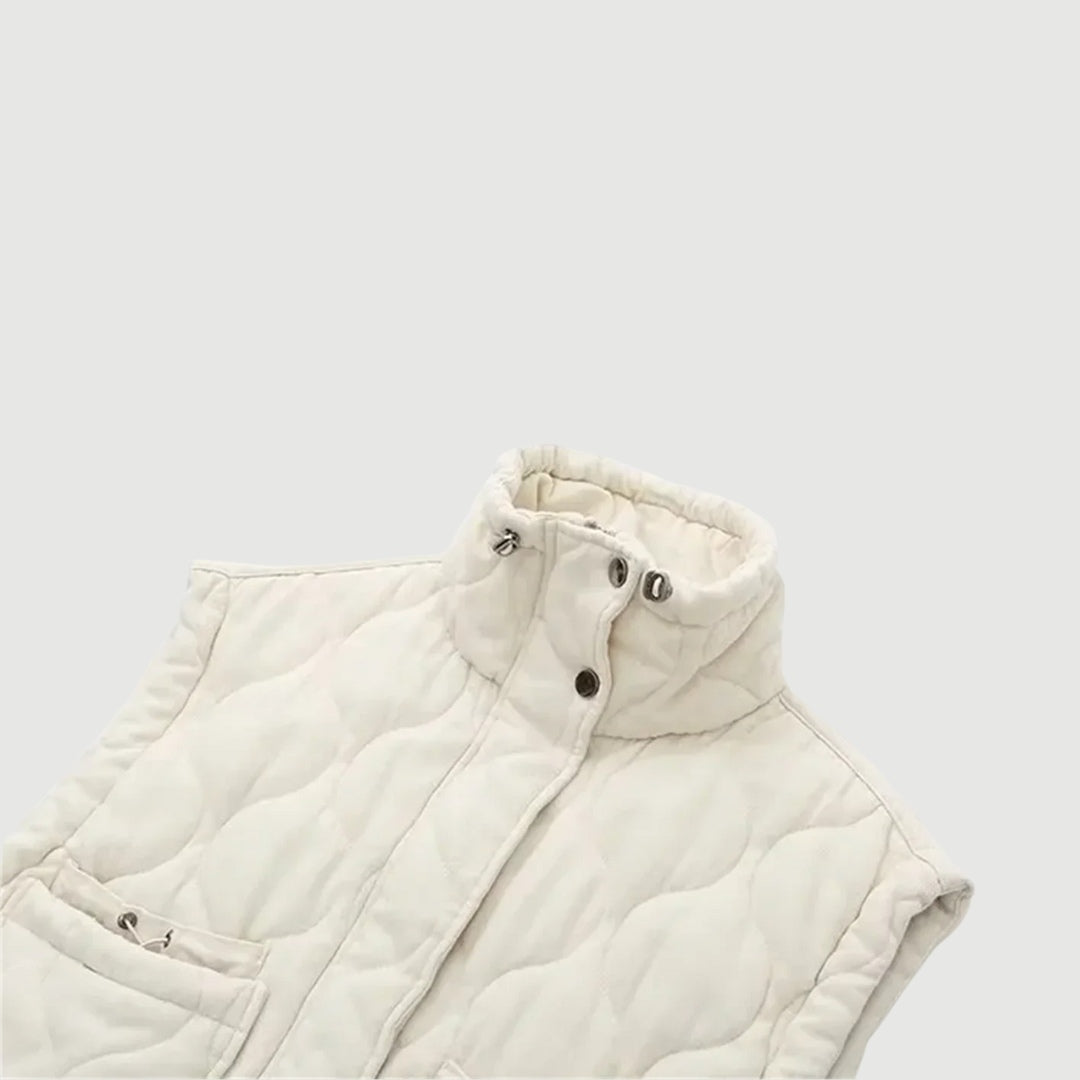 Vadderad väst i medellängd med ståkrage och tvättad workwear-look