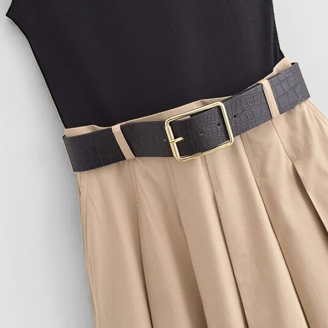 Ärmlös klänning med rynkad midja och veckad kjol i tvådelad look