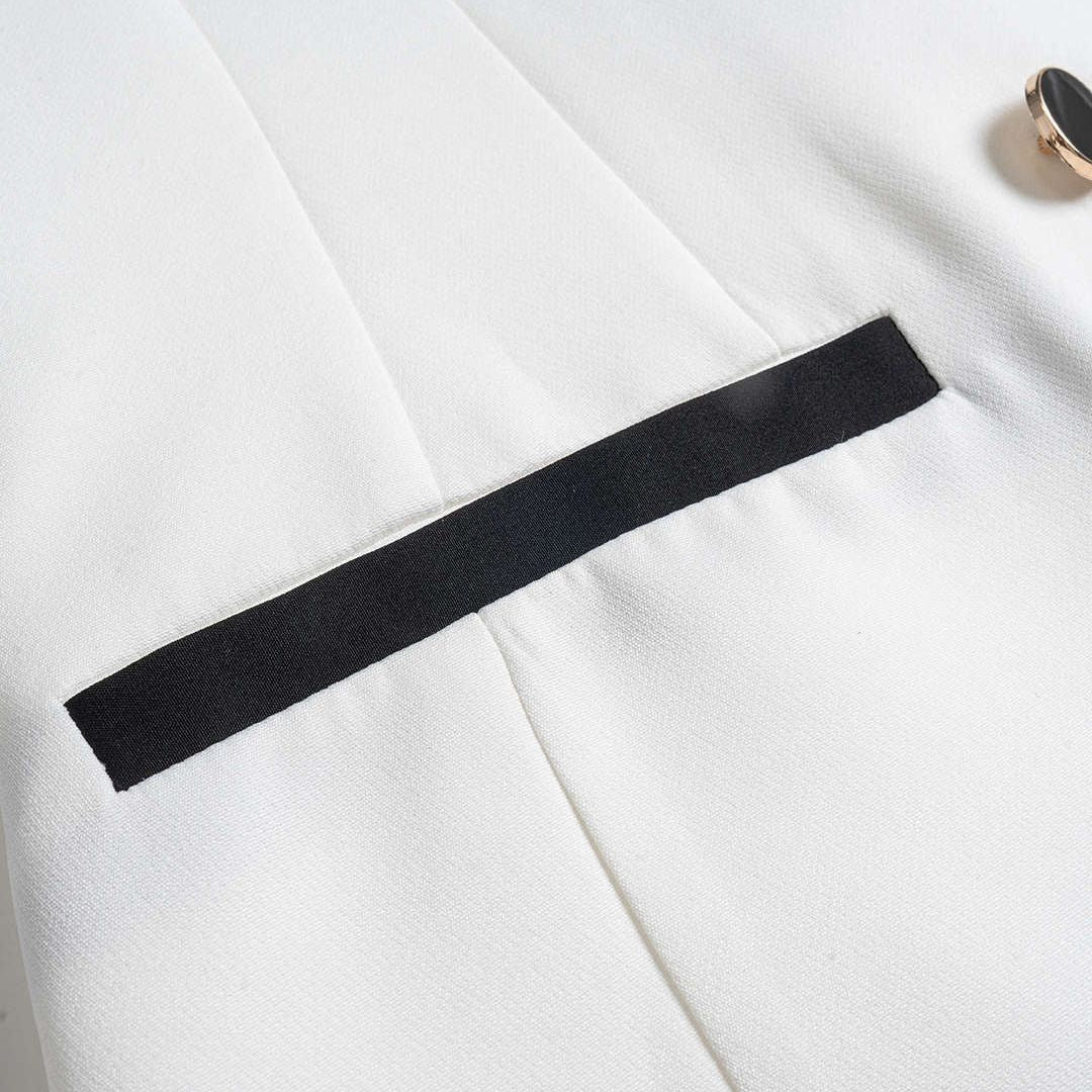 Vit ärmlös skräddarsydd väst i twill med dubbelknäppning och kontrastdetaljer