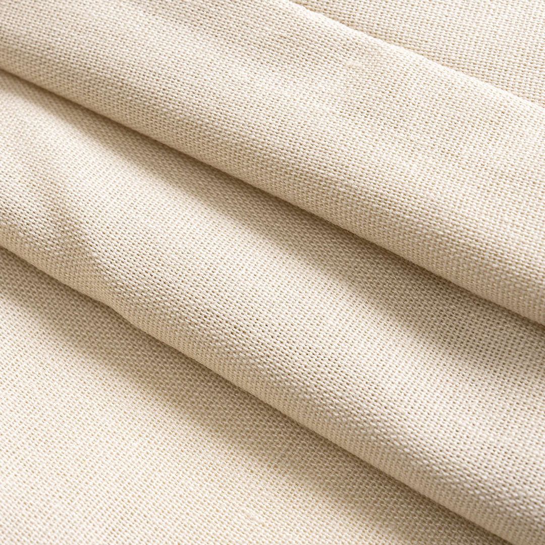 Beige ärmlös väst i vävd struktur med dekorativa snören och pärldetaljer