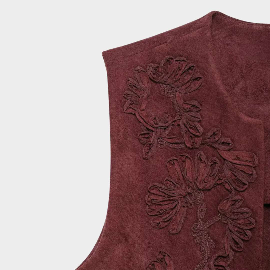 Broderad väst i kort modell med blommönster