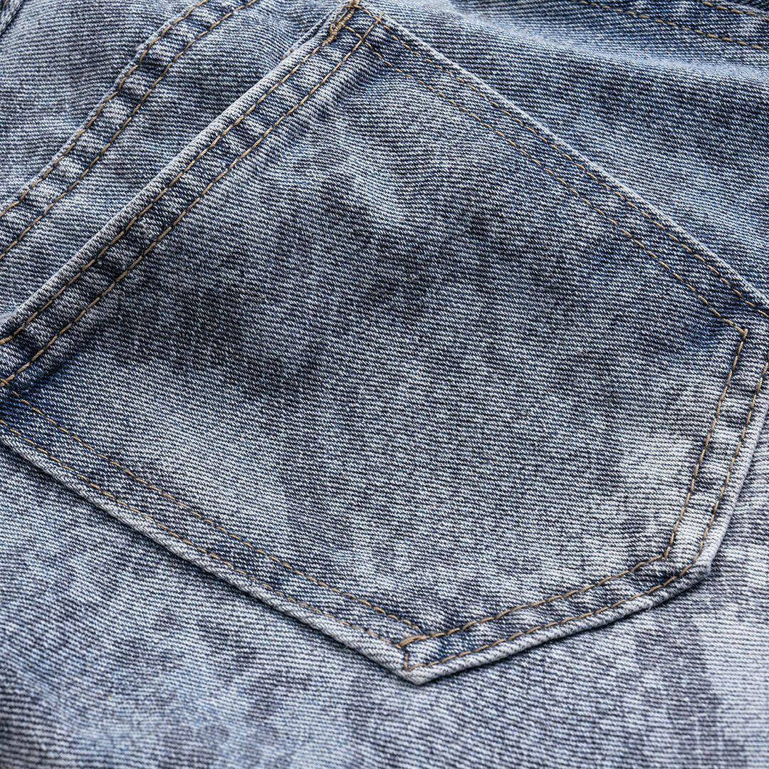 Blå denimjeans med ormskinnsmönster, raka ben och hög midja i tvättad finish
