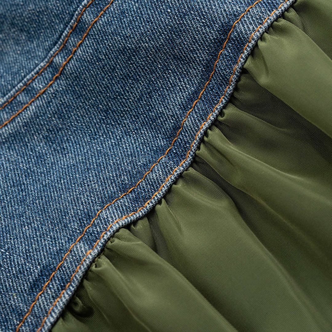 Grön bomberjacka med denimdetaljer i patchwork