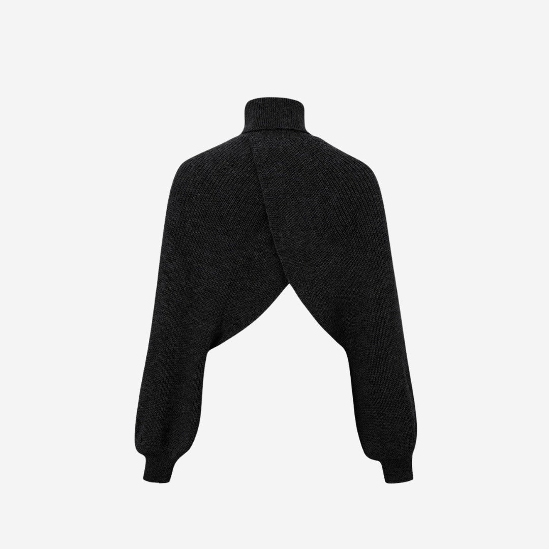 Stickad bolero med omlottdesign, polokrage och lös passform