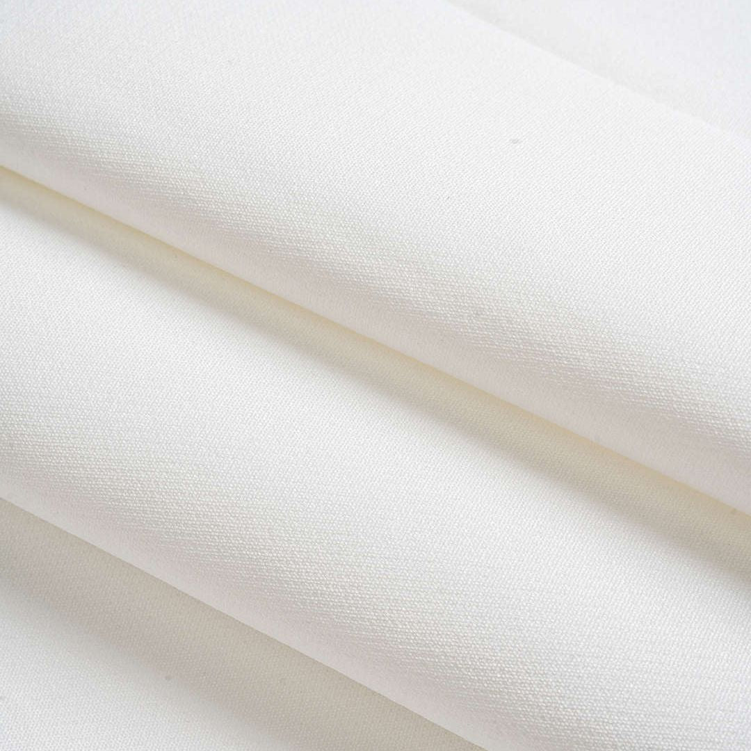 Vit ärmlös skräddarsydd väst i twill med dubbelknäppning och kontrastdetaljer