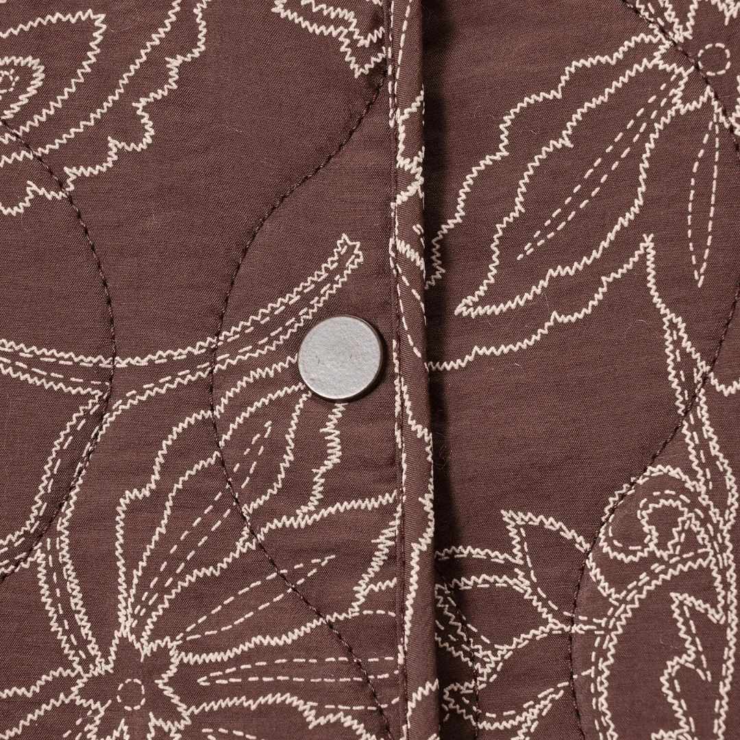 Kort blommönstrad vadderad jacka med broderi och rund hals