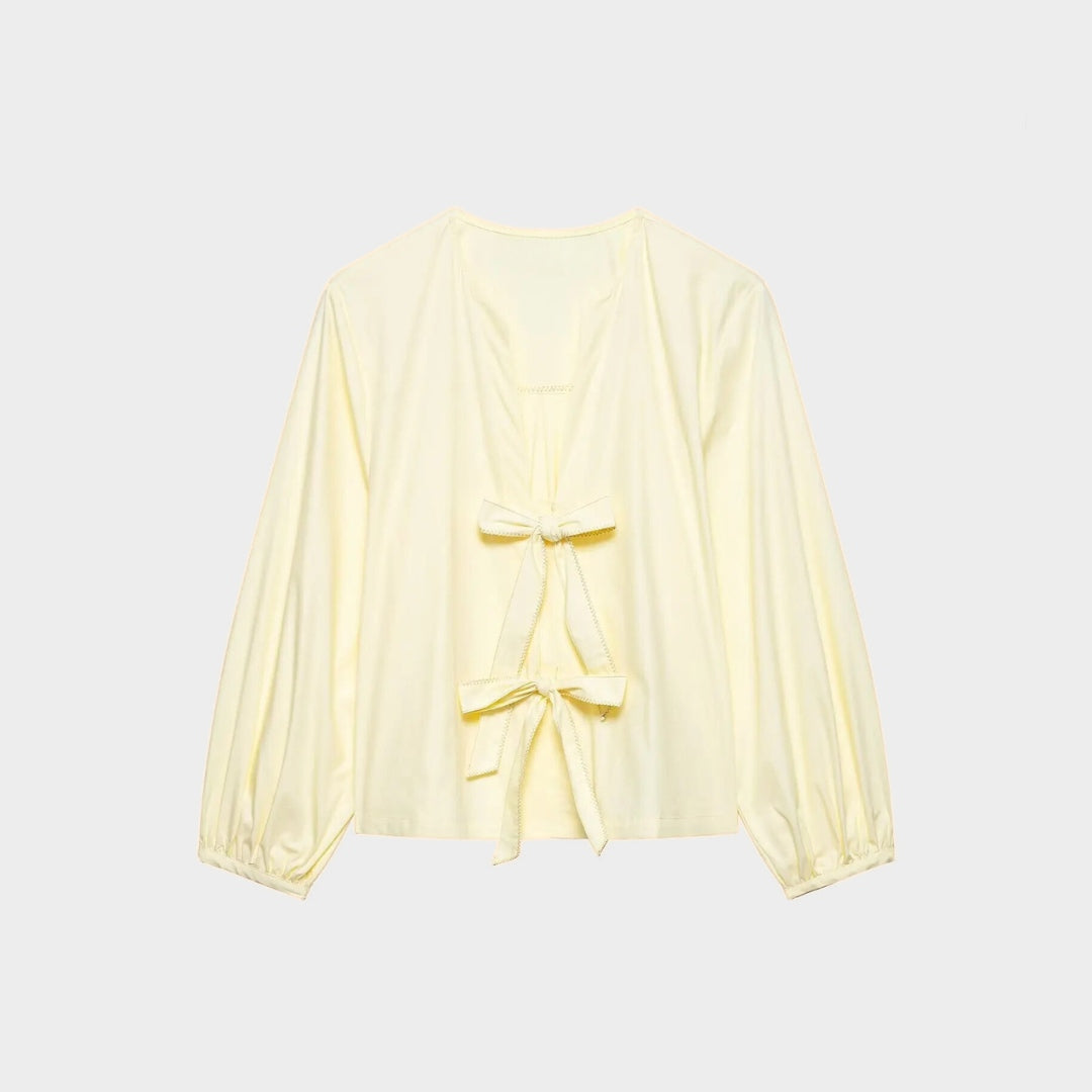 Blus i poplin med knytband och ränder