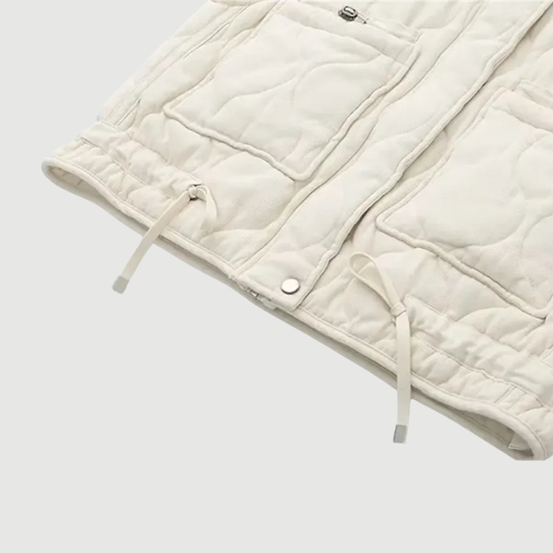 Vadderad väst i medellängd med ståkrage och tvättad workwear-look
