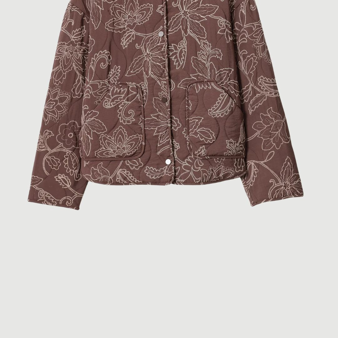 Kort blommönstrad vadderad jacka med broderi och rund hals