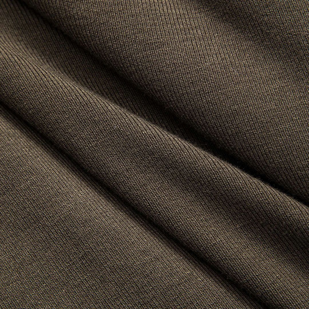 Midiklänning med långärmad topp i glansig krokodilpräglad imitation och draperad kjol i jersey med hög slits