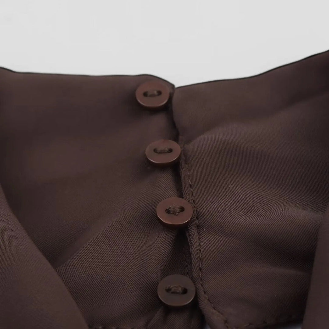 Midiklänning med draperad halterneck och smal silhuett