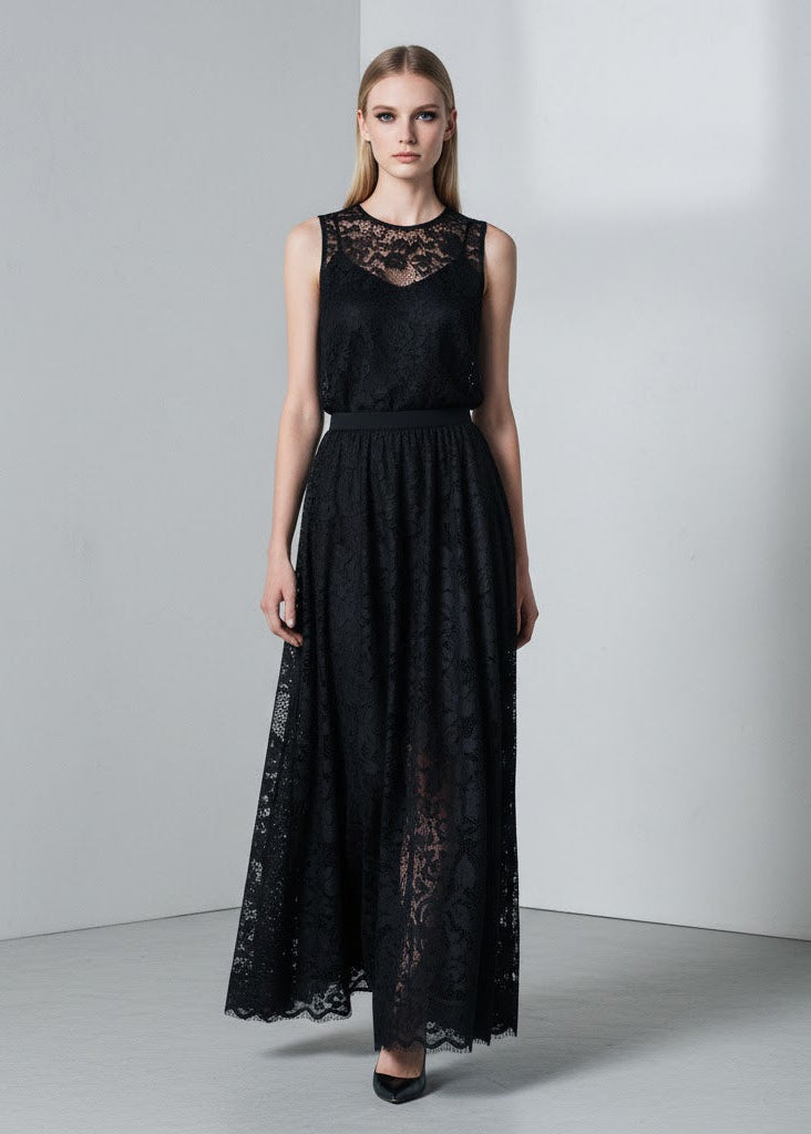 Kjol i spets med naturlig midja, ankellängd, A-linje silhuett och delikat struktur