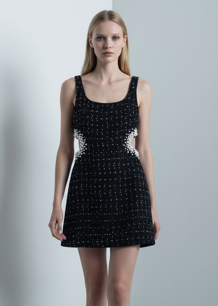 Svart ärmlös miniklänning med pärldetaljer