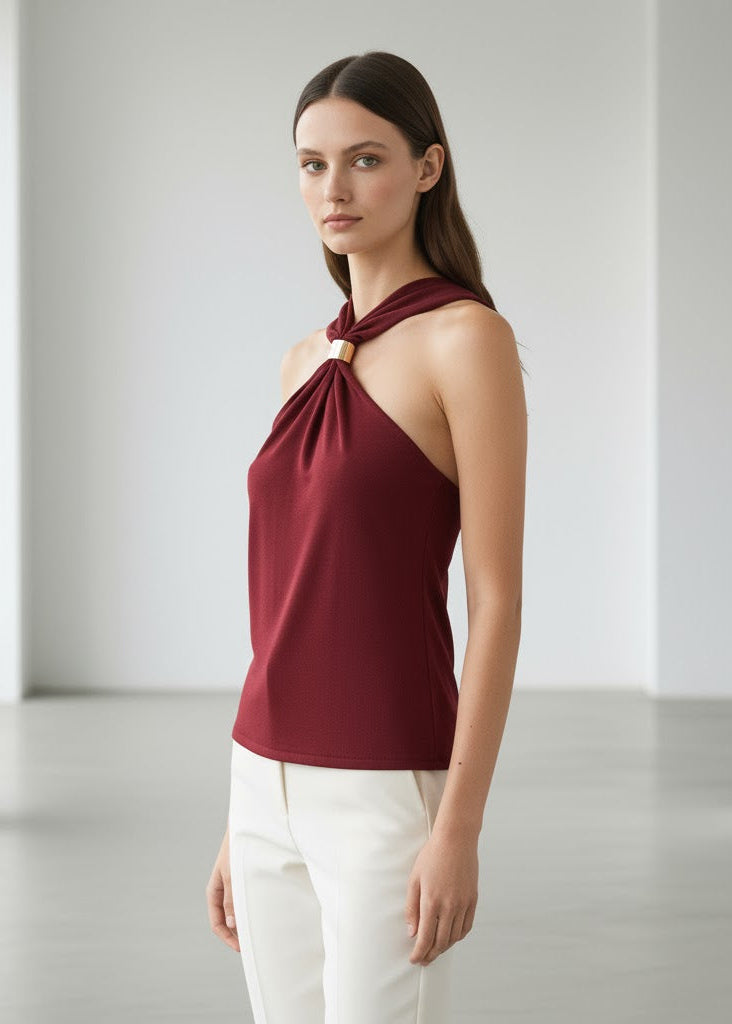 Stickad halterneck-top med breda axelband och gulddetalj