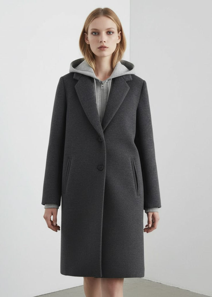 Lång kappa med infälld huva knappar och dragkedja