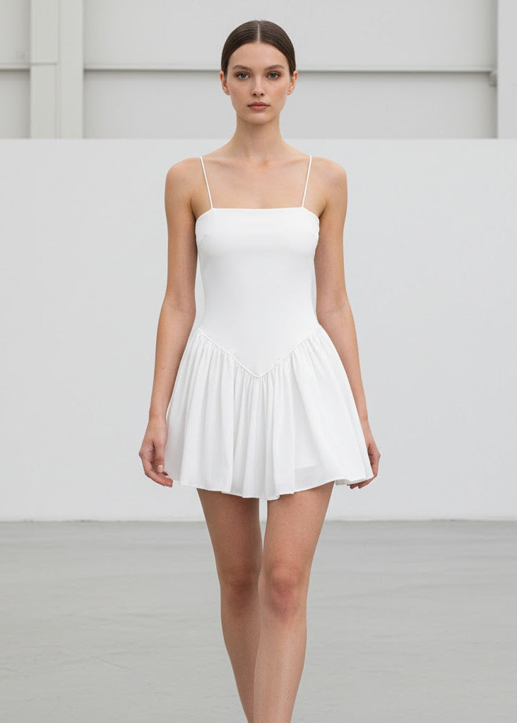 Miniklänning med trikåtopp och veckad kjol