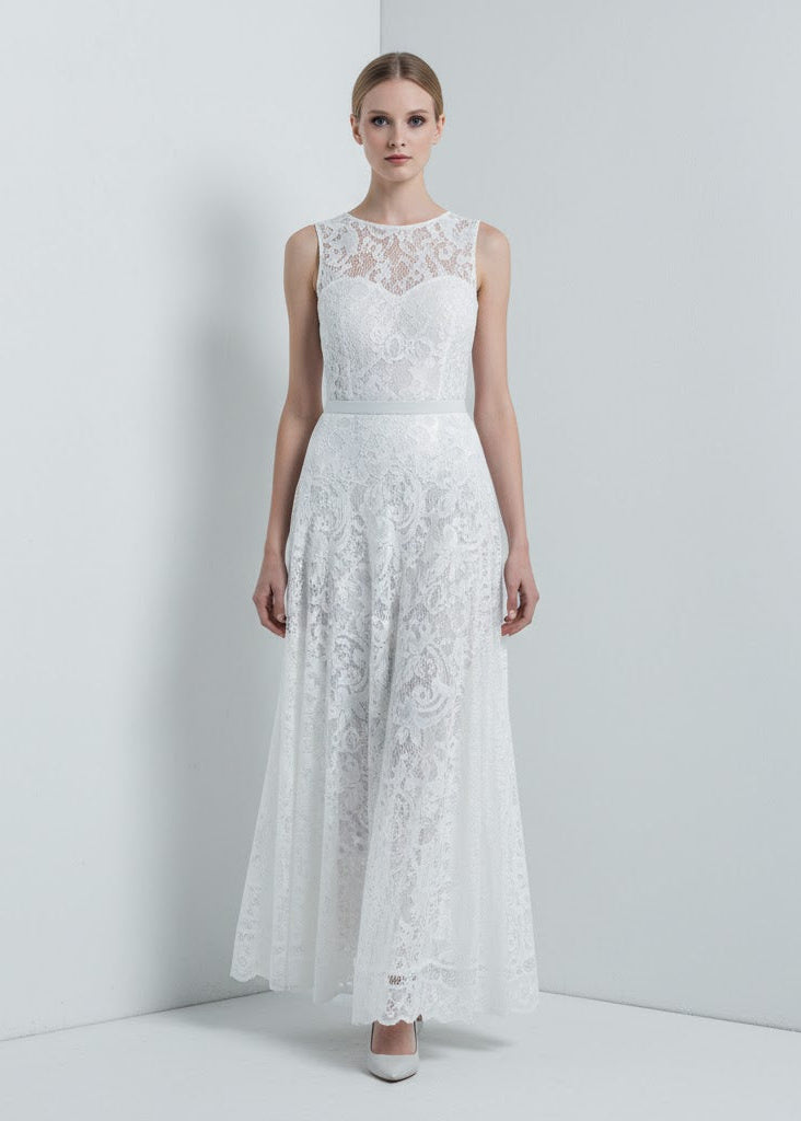 Kjol i spets med naturlig midja, ankellängd, A-linje silhuett och delikat struktur