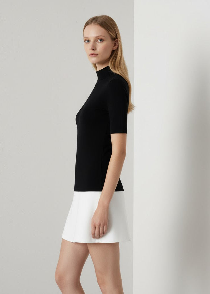 Tvåfärgad trikåklänning med polokrage och halvlånga ärmar