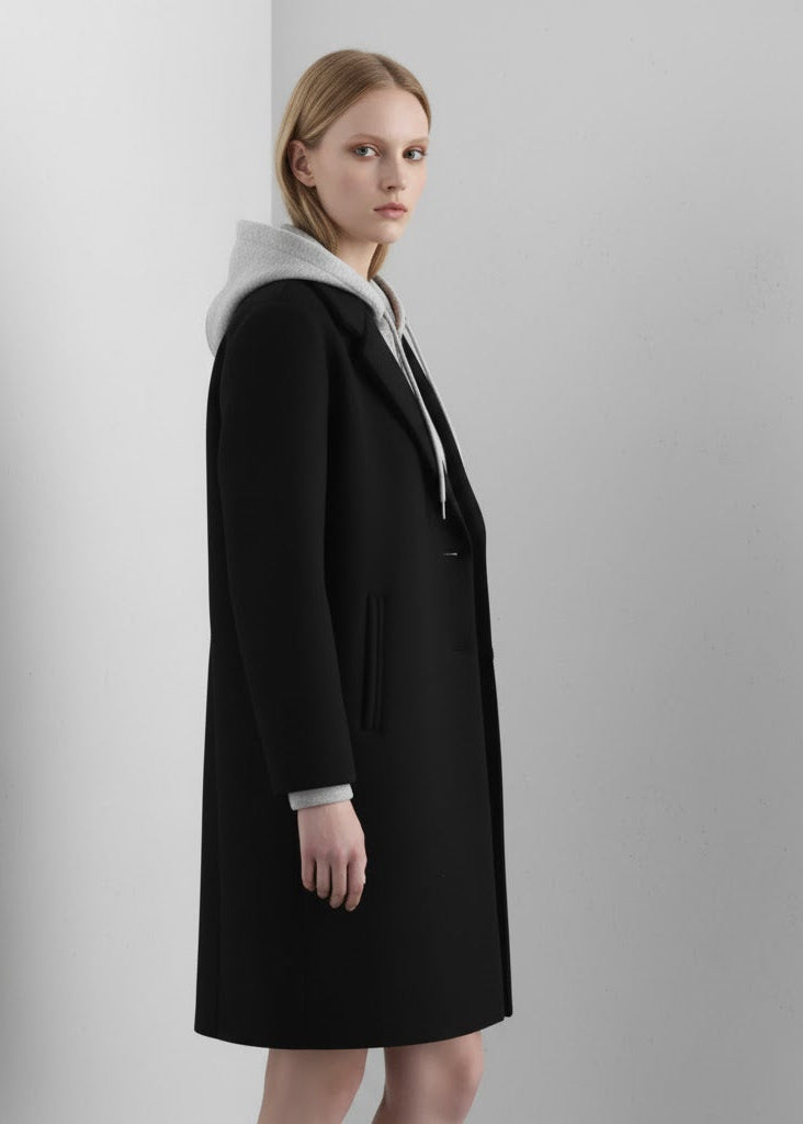 Lång kappa med infälld huva knappar och dragkedja